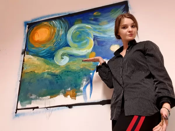 obraz malowany na scianie w szkole